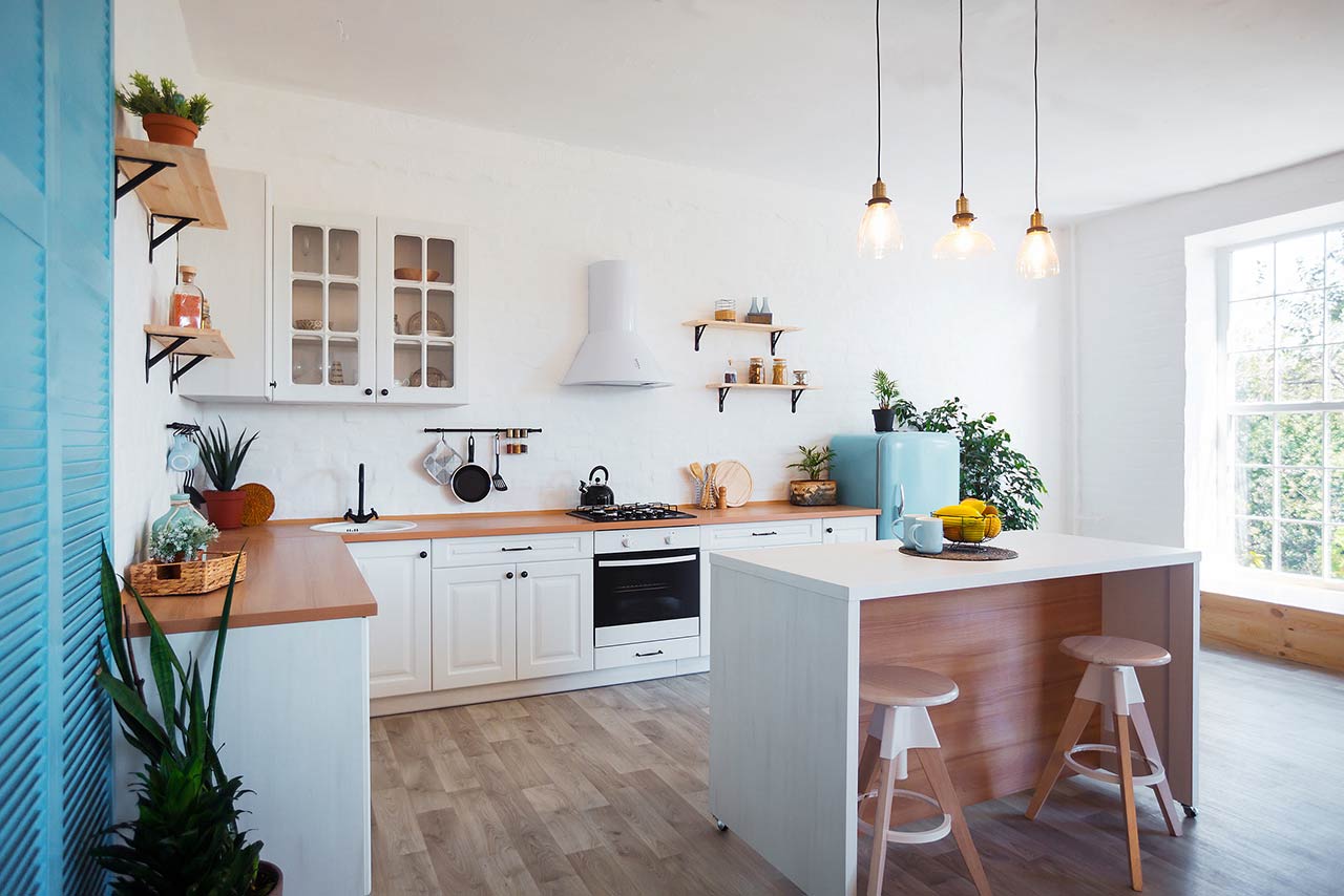 modern kitchen interior with island, sink, cabinets, and big window in new luxury home